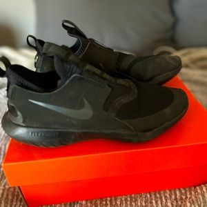 Black Nike running shoes for sale.